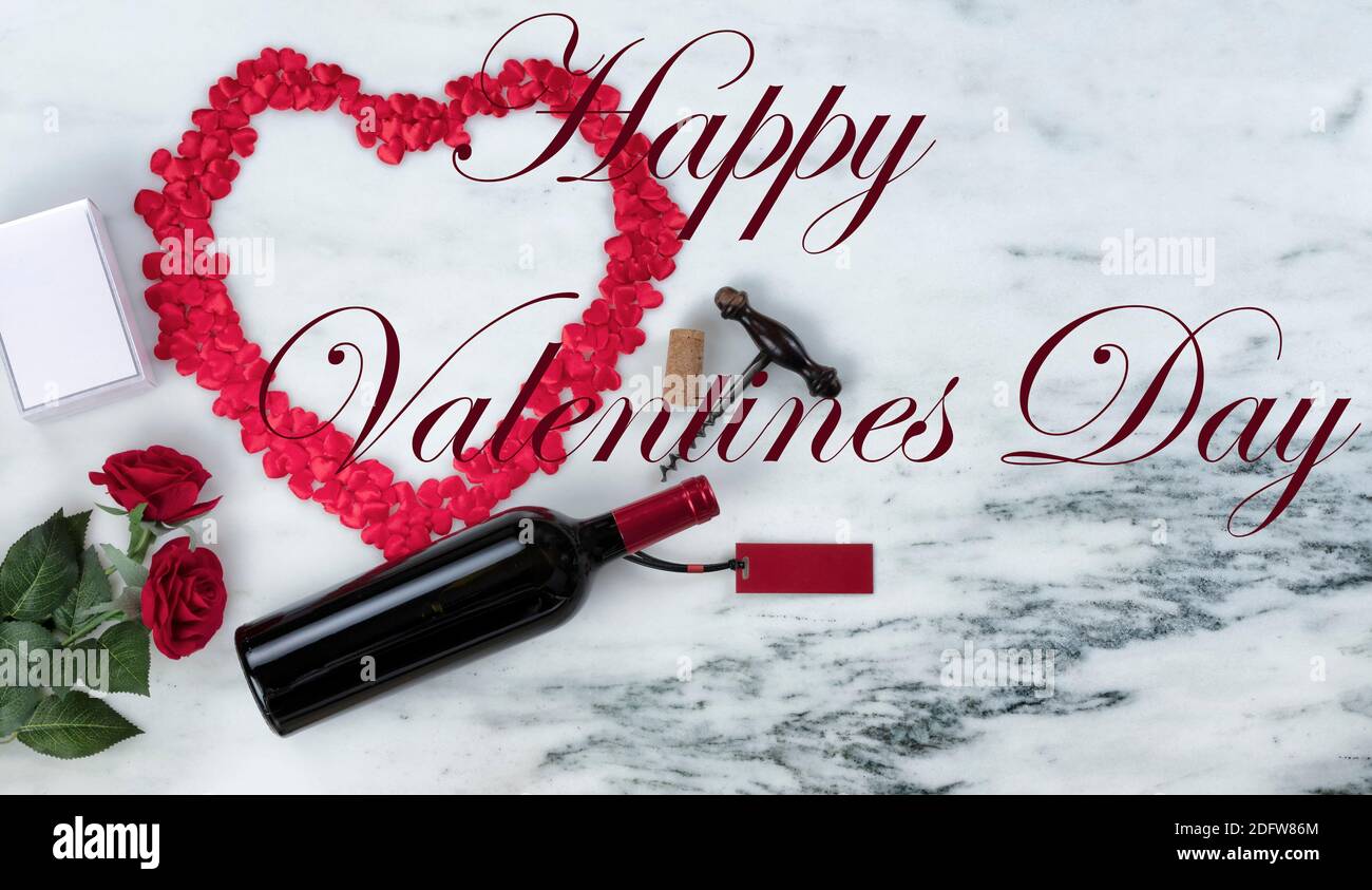 Happy Valentines Day with lots of romantic gifts on marble stone background setting plus text message Stock Photo