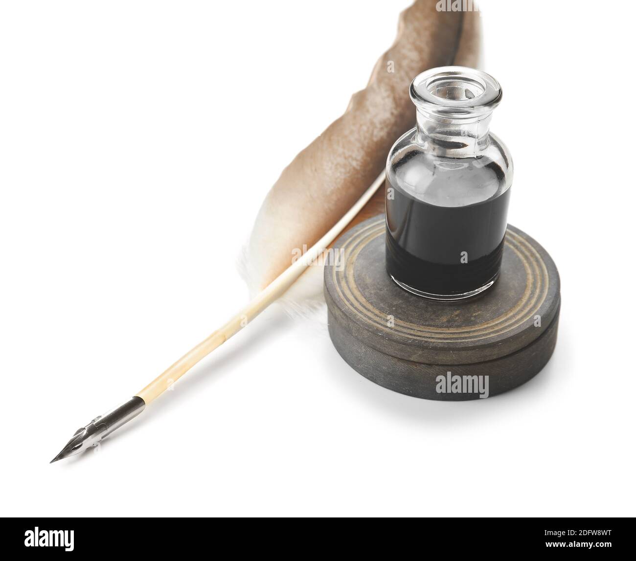 Feather pen and inkwell on white background Stock Photo - Alamy