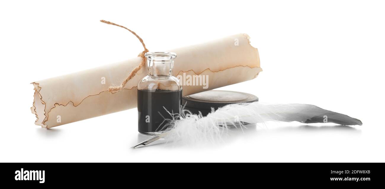 Feather pen with scroll and inkwell on white background Stock Photo