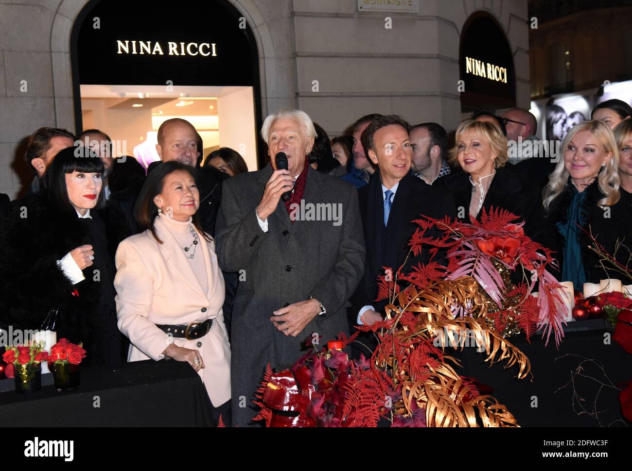 Jean-Claude Jitrois, Chantal Thomass, Mayor of 8th Distric of Paris Jeanne  D'Hautesserre, President of the 'Comite Montaigne' Jean-Claude Cathalan,  Stephane Bern, Marie-Christiane Marek during Christmas Montaigne Avenue  Illuminations as part of the