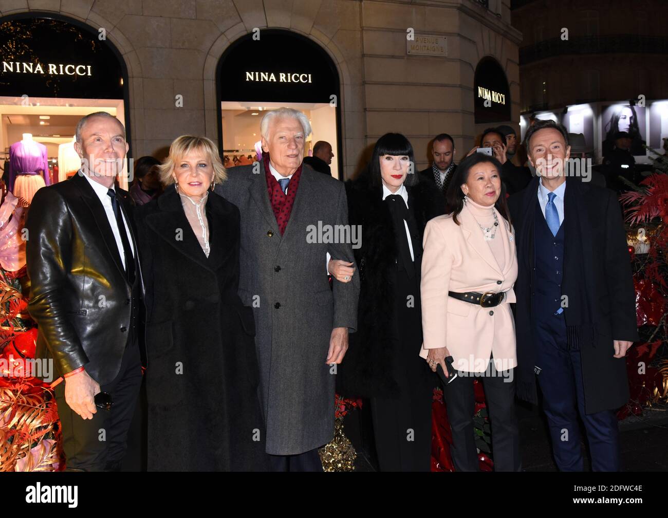 Jean-Claude Jitrois, Chantal Thomass, Mayor of 8th Distric of Paris Jeanne  D'Hautesserre, President of the 'Comite Montaigne' Jean-Claude Cathalan,  Stephane Bern, Marie-Christiane Marek during Christmas Montaigne Avenue  Illuminations as part of the