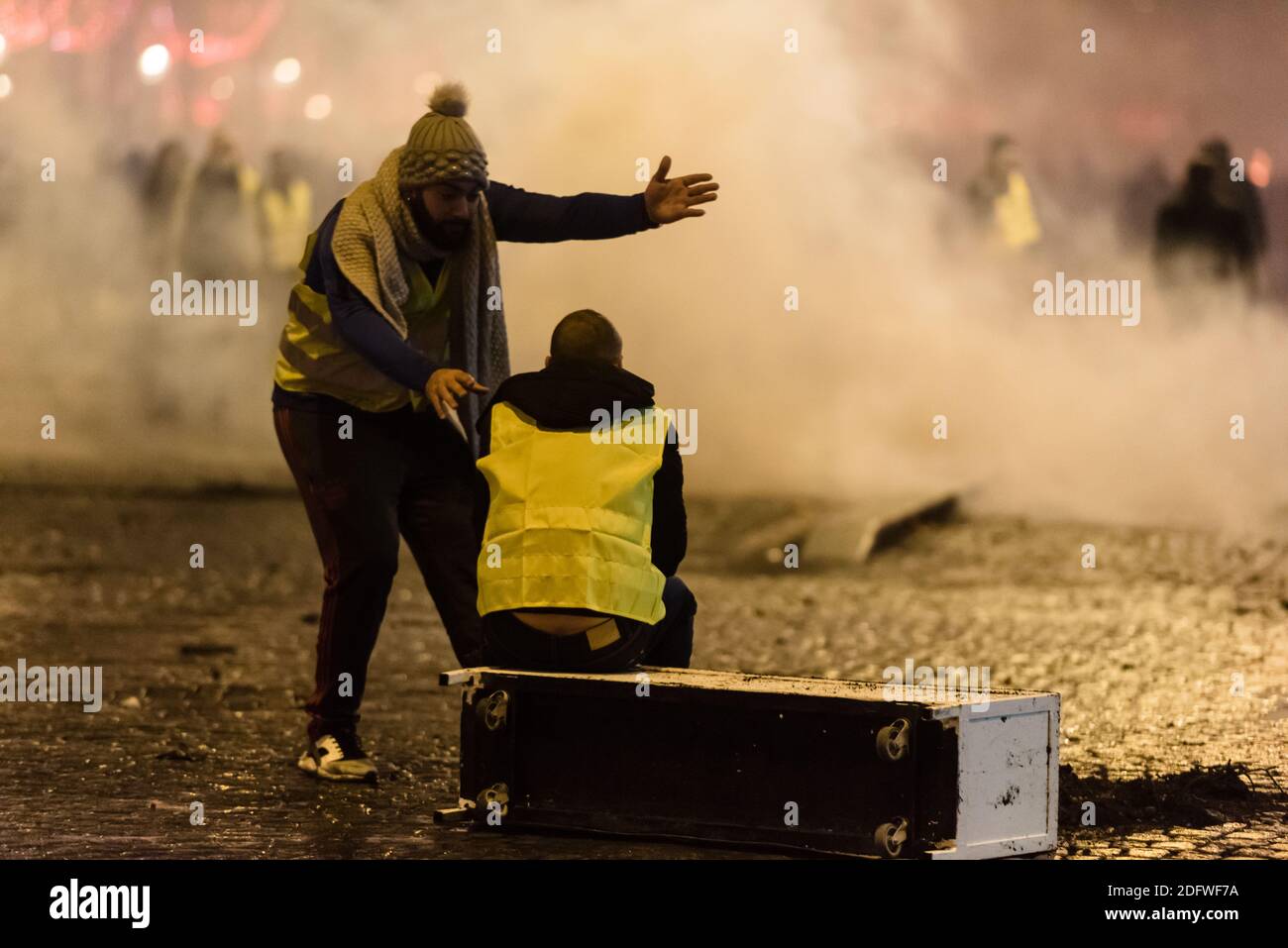Yellow vests (Gilets Jaunes) protestors clash with riot police during a ...