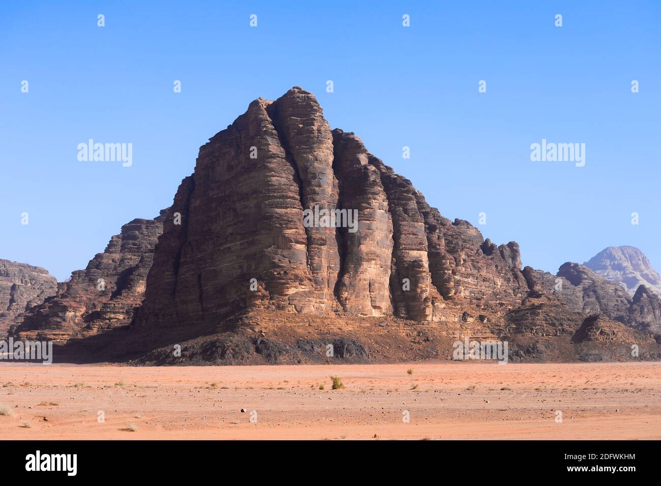 The Seven Pillars of Wisdom in Wadi Rum, Jordan. Valley of the Moon rock formation named by the famous epic movie Lawrence of Arabia. Wadi al-Qamar. Stock Photo