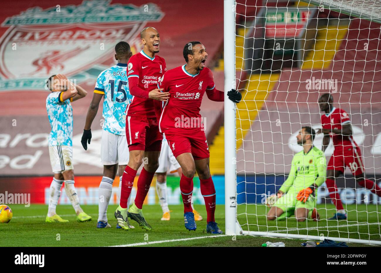 Liverpool. 7th Dec, 2020. Liverpool's Joel Matip (4th L) celebrates after scoring the third goal during the English Premier League match between Liverpool FC and Wolverhampton Wanderers FC in Liverpool, Britain, on Dec. 6, 2020. Credit: Xinhua/Alamy Live News Stock Photo