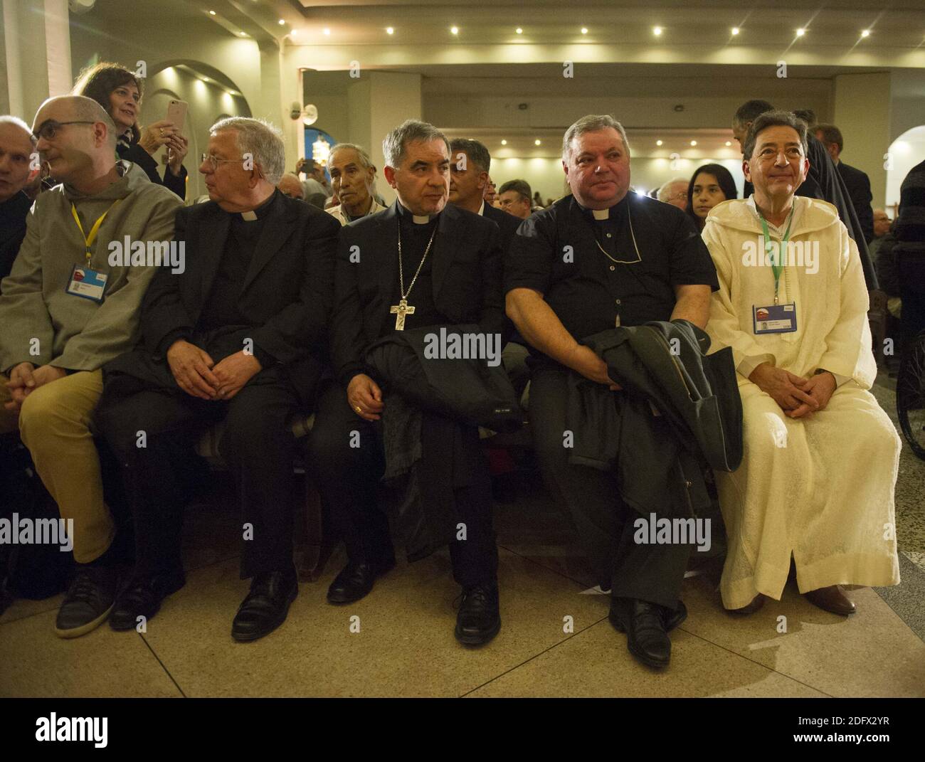 Muslim and catholic officials among faithfuls attend a vigil ahead of Tibhirine (or Tibehirine) monks beatification at Sainte-Marie cathedral in Oran, Algeria on Friday December 7, 2018. On the night of 26–27 March 1996, seven monks of the Trappist order from the Atlas Abbey of Tibhirine near Medea, Algeria were kidnapped during the Algerian Civil War. They were held for two months, and found dead in late May 1996. The circumstances of their kidnapping and death remain controversial; the Armed Islamic Group (Groupe Islamique Arme, GIA) claimed responsibility for both, but in 2009, retired Gene Stock Photo