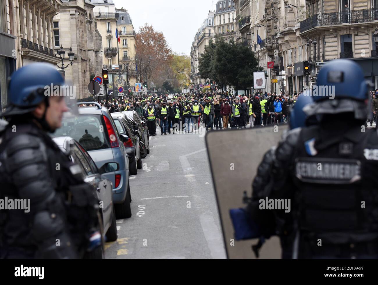 Police clash on Saturday december 8, 2018 in Paris, France, with protesters  staging a fourth weekend of "gilets jaunes," or "yellow vest,"  demonstrations against the government of President Macron. Officers fired  rubber