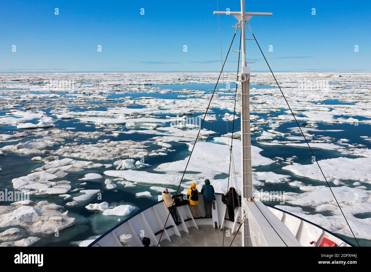 Cruise ship sailing through floating ice on Bering Sea, Russia Far East Stock Photo