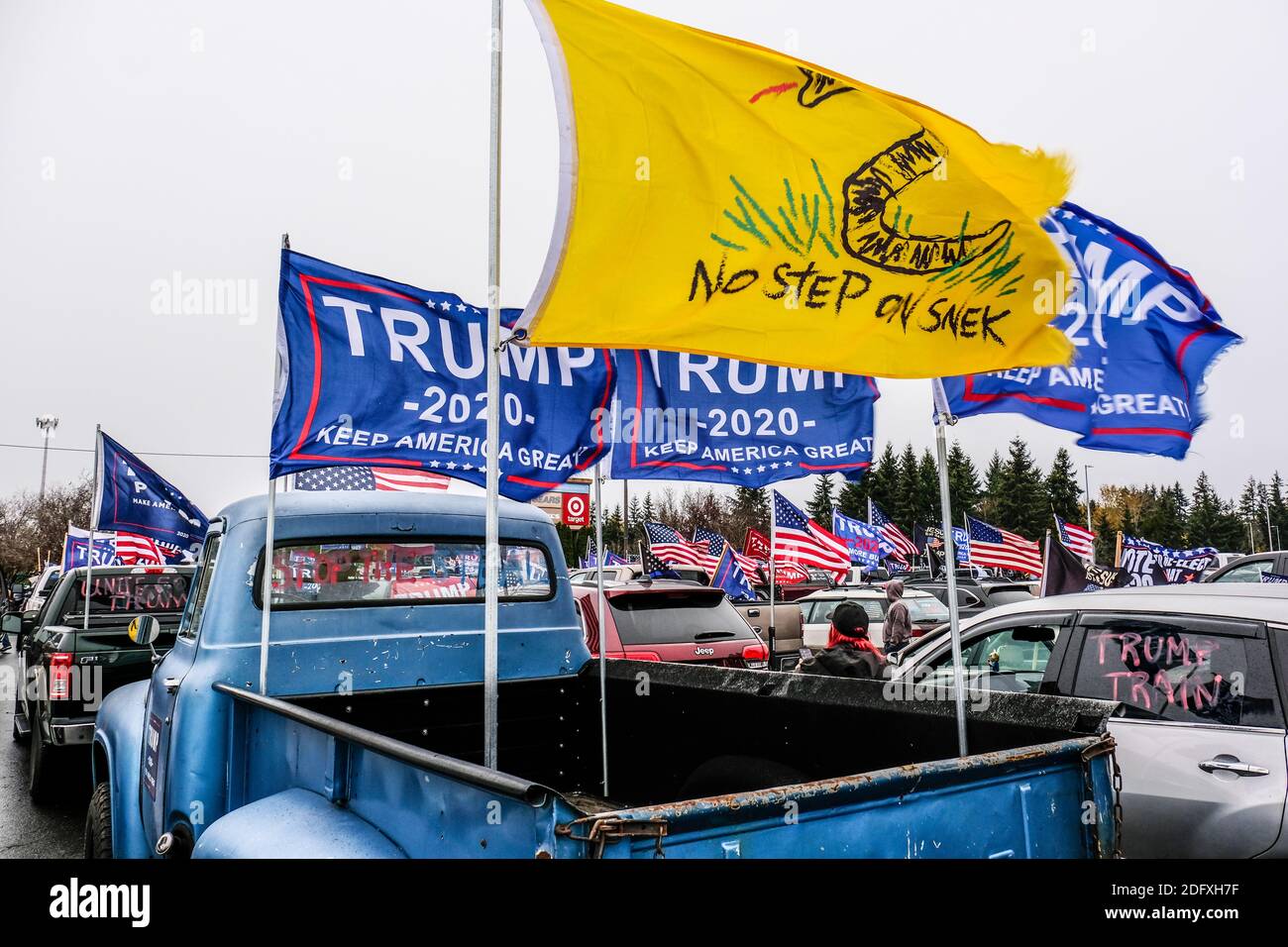 No Step On Snek and Trump flags on back of pickup truck at a Trump Rally Stock Photo
