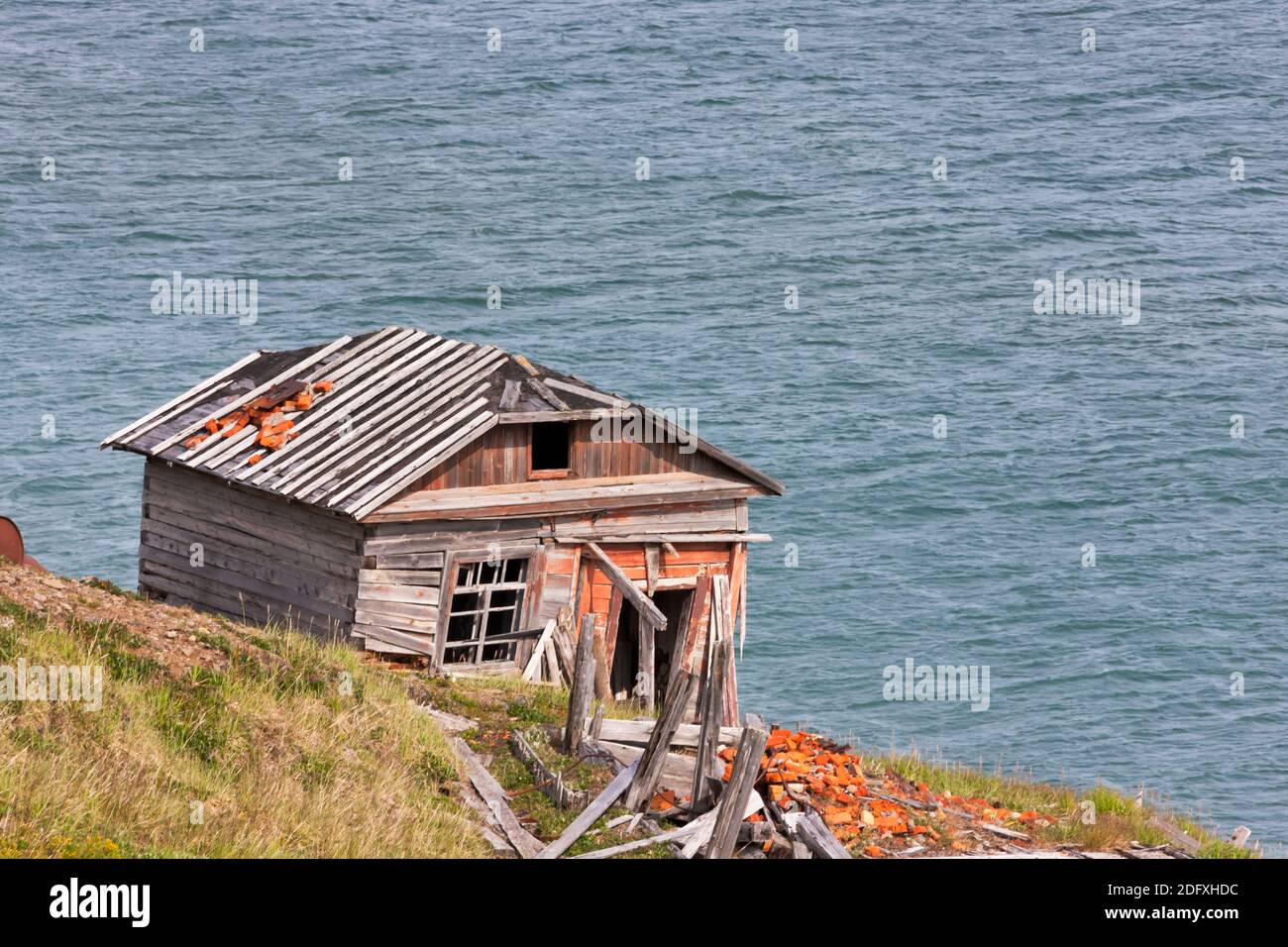 Settler's old house, Cape Dezhnev, most eastern corner of Eurasia, Russian Far East Stock Photo