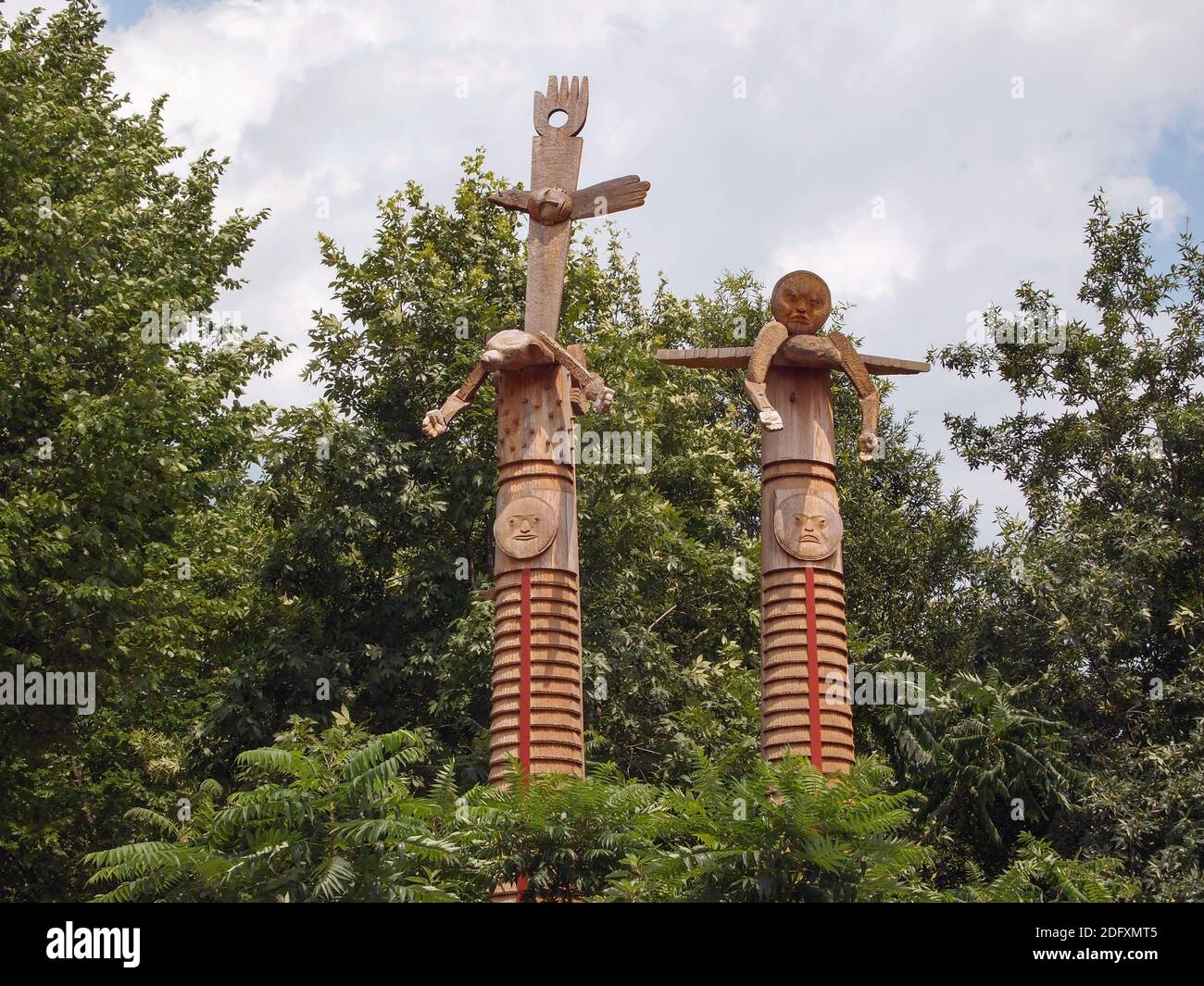 WASHINGTON, DC - JUNE 29, 2015: A pair of sculptures by Native American artist Rick Bartow, titled We Were Always Here stands at the entrance to the S Stock Photo