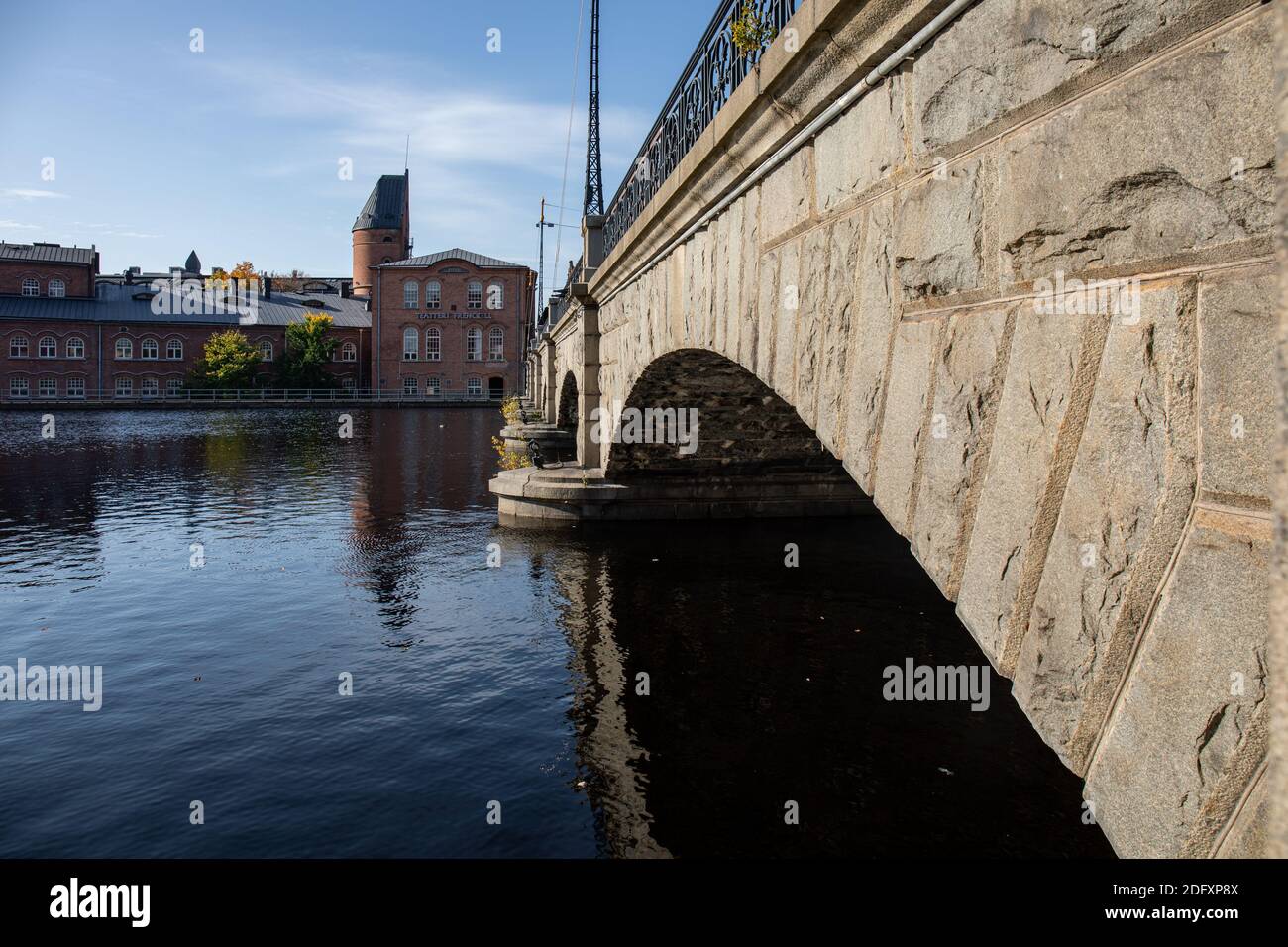 Satakunnansilta arch bridge over Tammerkoski in Tampere, Finland Stock Photo