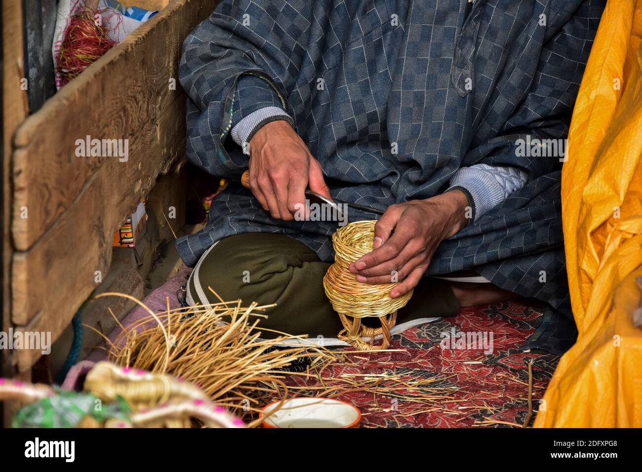 Budgam, India. 06th Dec, 2020. A Kashmiri artisan makes a 'Kangri', a traditional fire pot at his workshop in Budgam, about 35kms from Srinagar the summer capital of Jammu and Kashmir. Credit: SOPA Images Limited/Alamy Live News Stock Photo