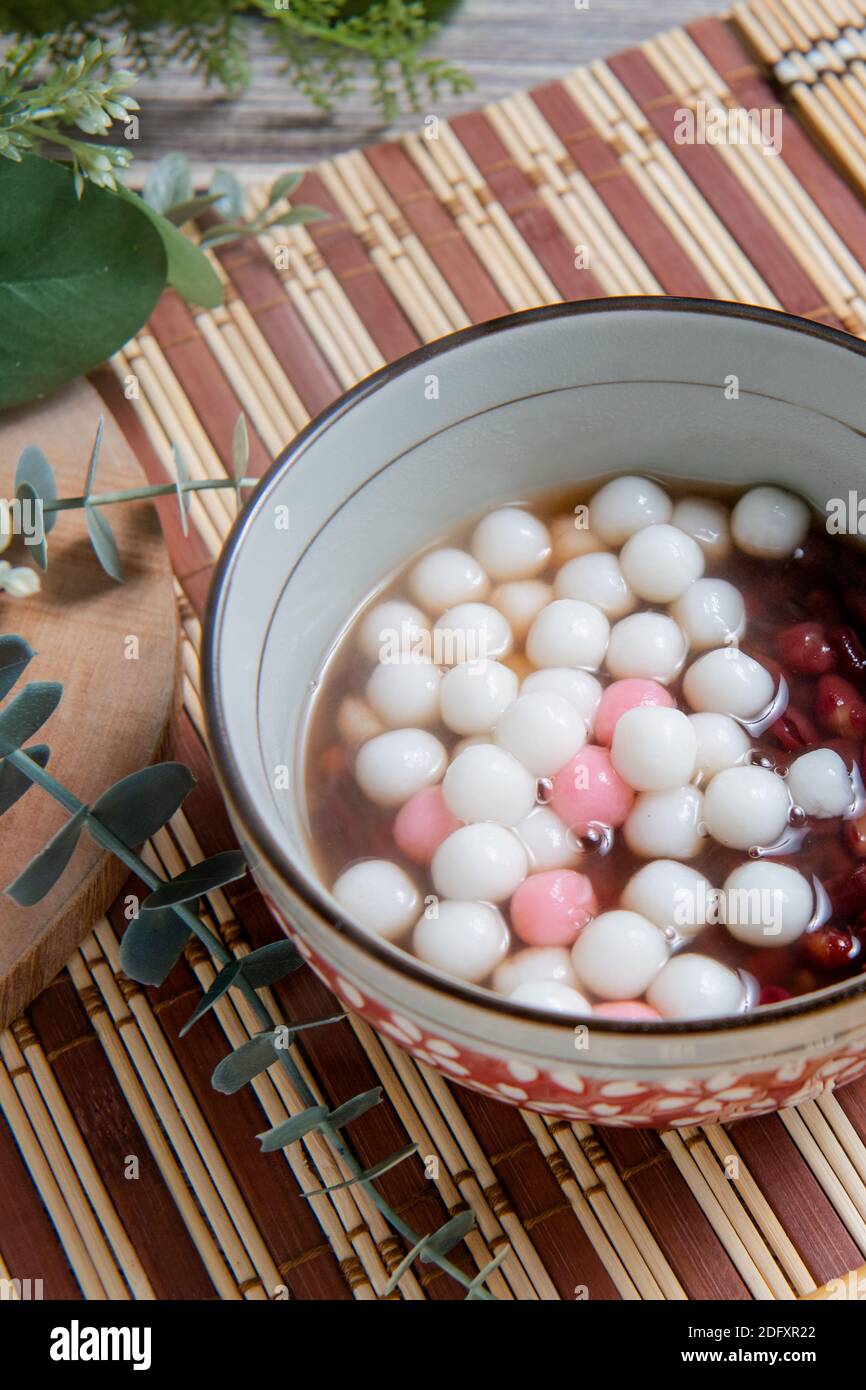 Chinese glutinous rice balls ,Chinese are eaten during (Yuanxiao) served as  a dessert on a Lantern Festival ,Chinese wedding day and Winter Solstice F  Stock Photo - Alamy, image size:866x1390
