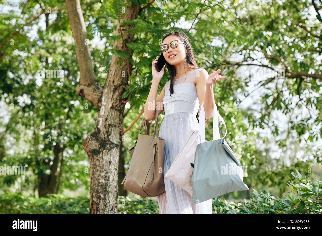 Woman talking on phone Stock Photo