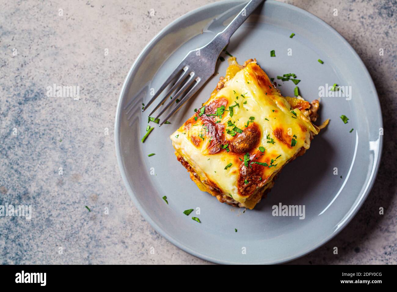 Traditional Greek potato and meat casserole with cheese moussaka