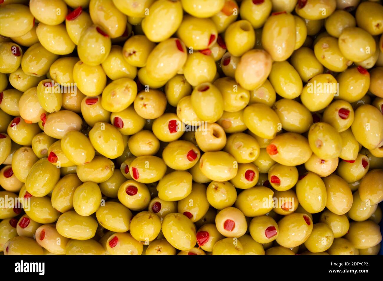 Green olives as health food preserved in olive oil Stock Photo Alamy