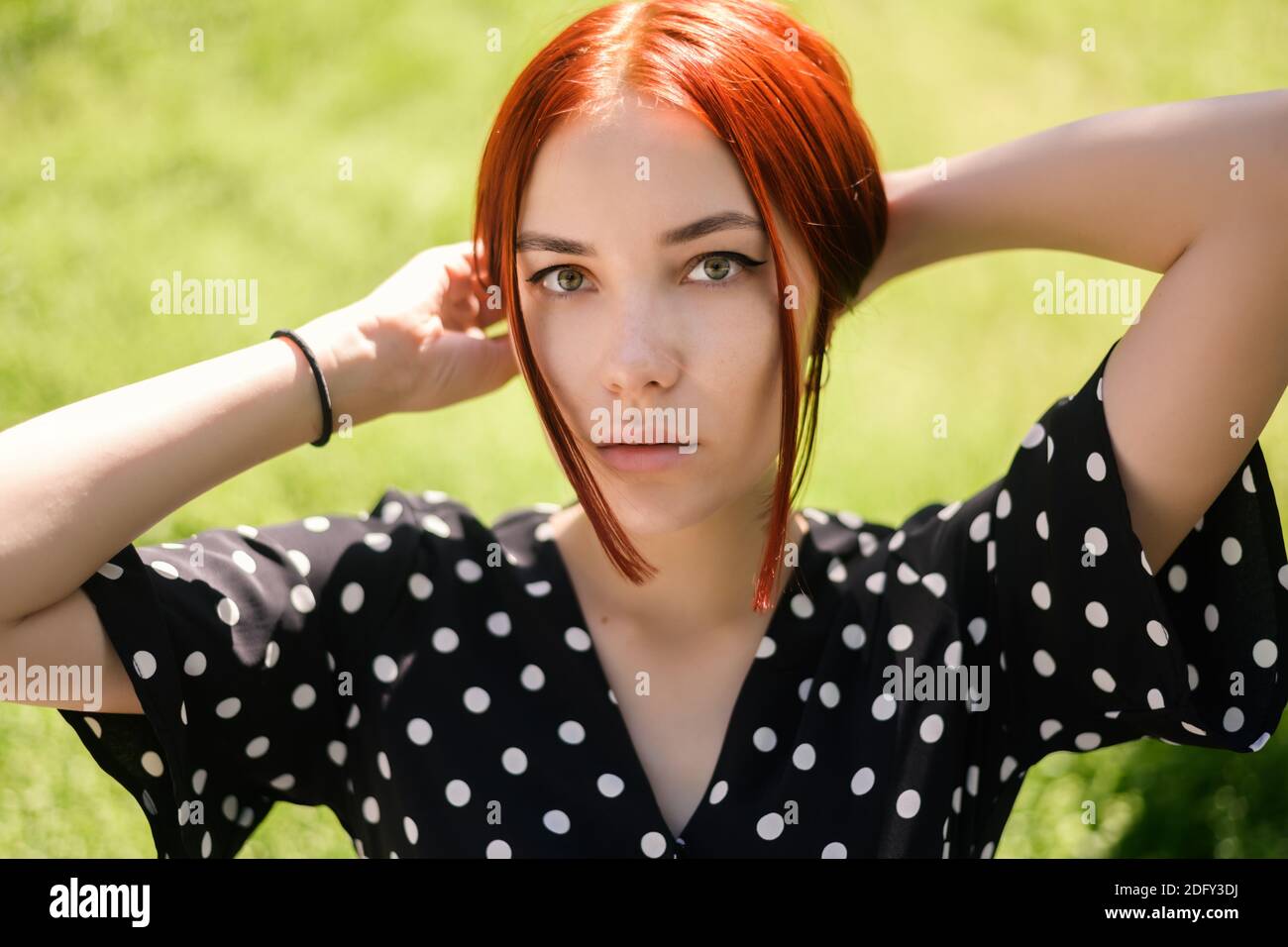 Portrait of beautiful young woman with red hair Stock Photo - Alamy