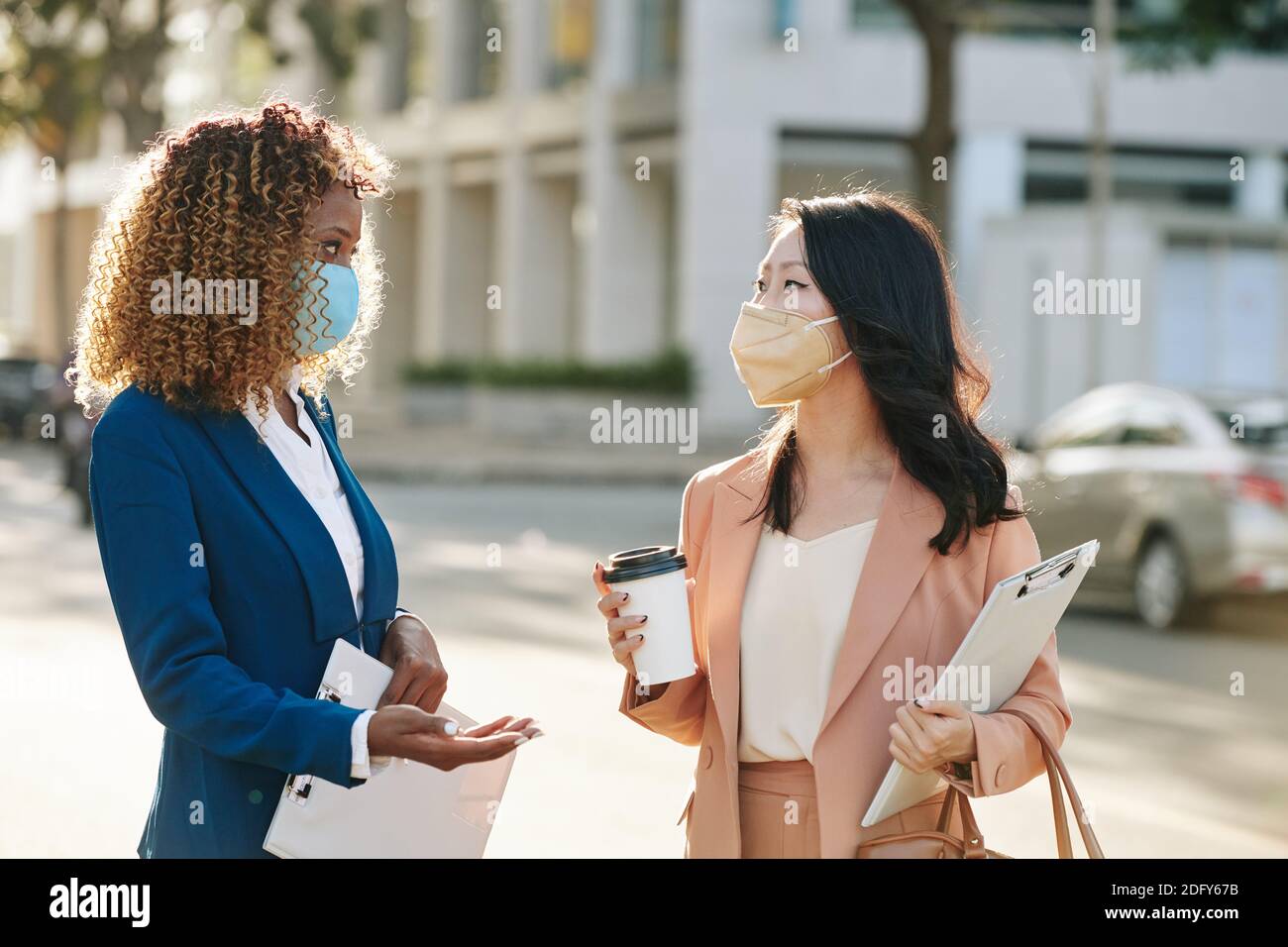 Businesswomen discussing project Stock Photo