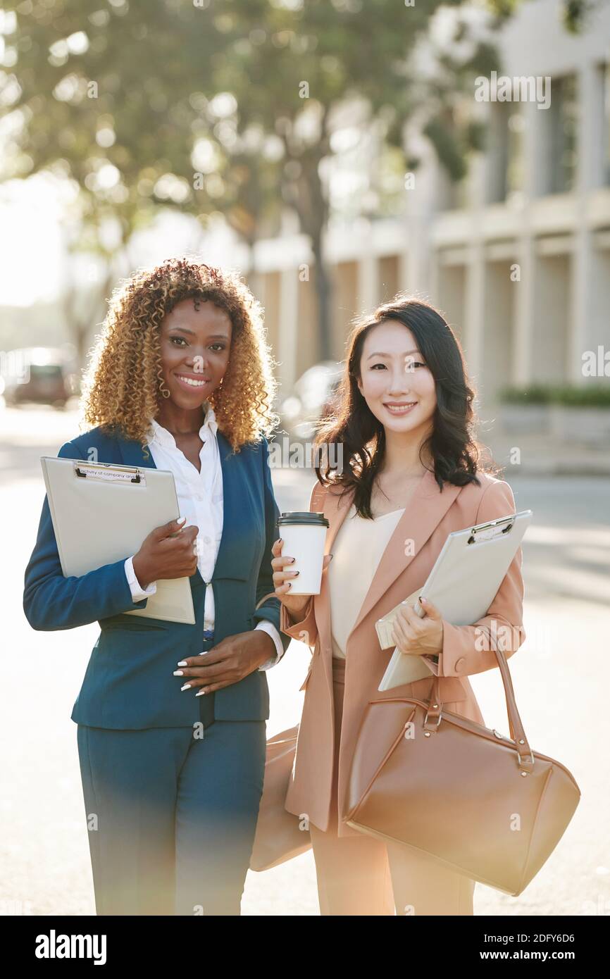 Young smiling female entrepreneurs Stock Photo