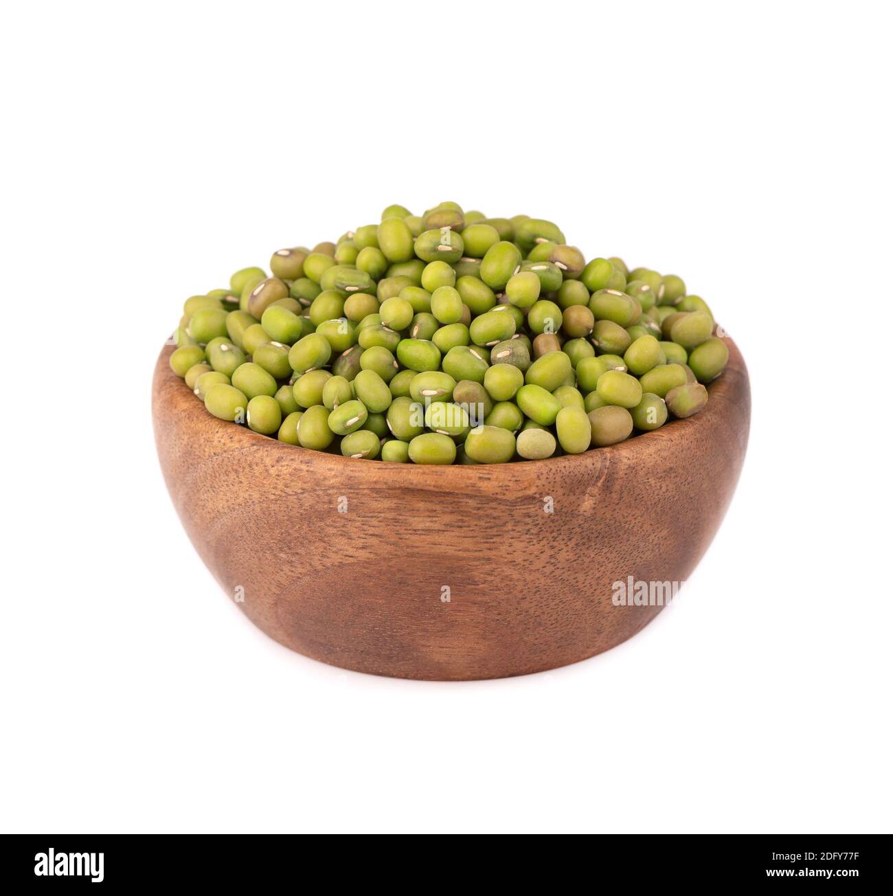 Mung beans in wooden bowl, isolated on white background. Vigna radiata. Stock Photo