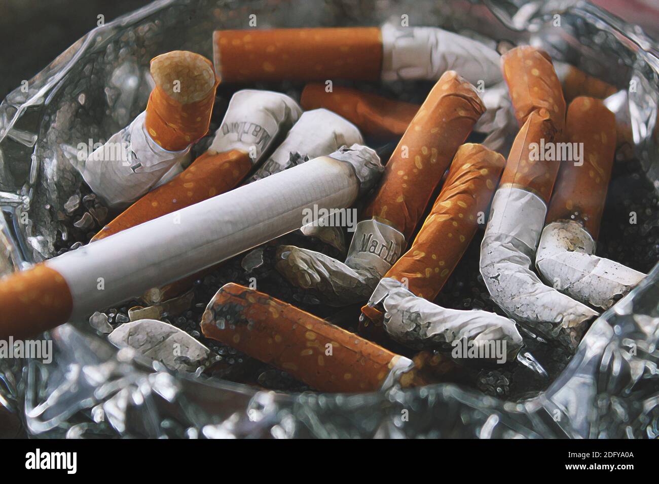 close-up of an ashtray full of cigarettes Stock Photo