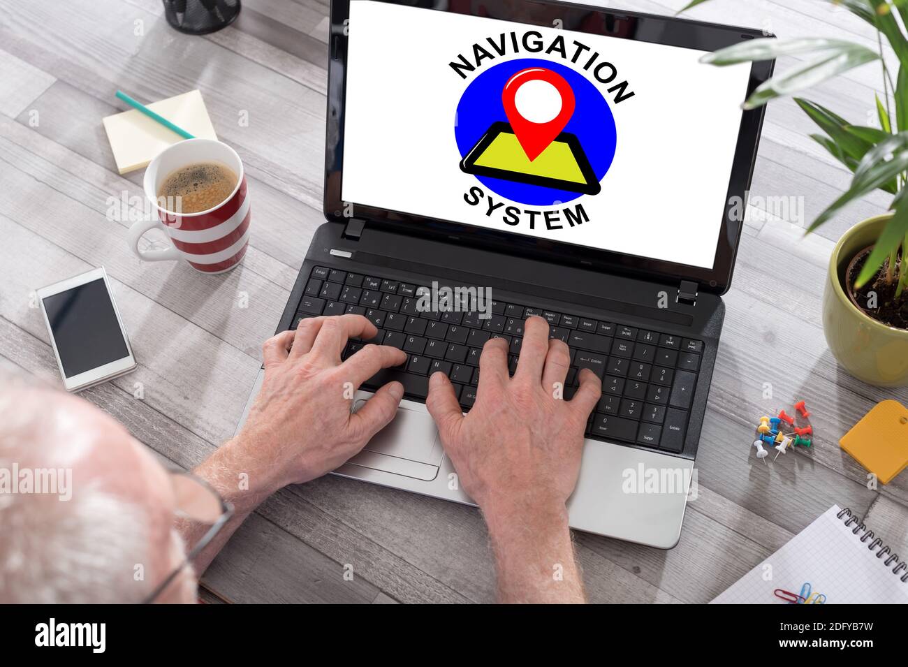 Navigation system concept shown on a laptop used by a man Stock Photo ...