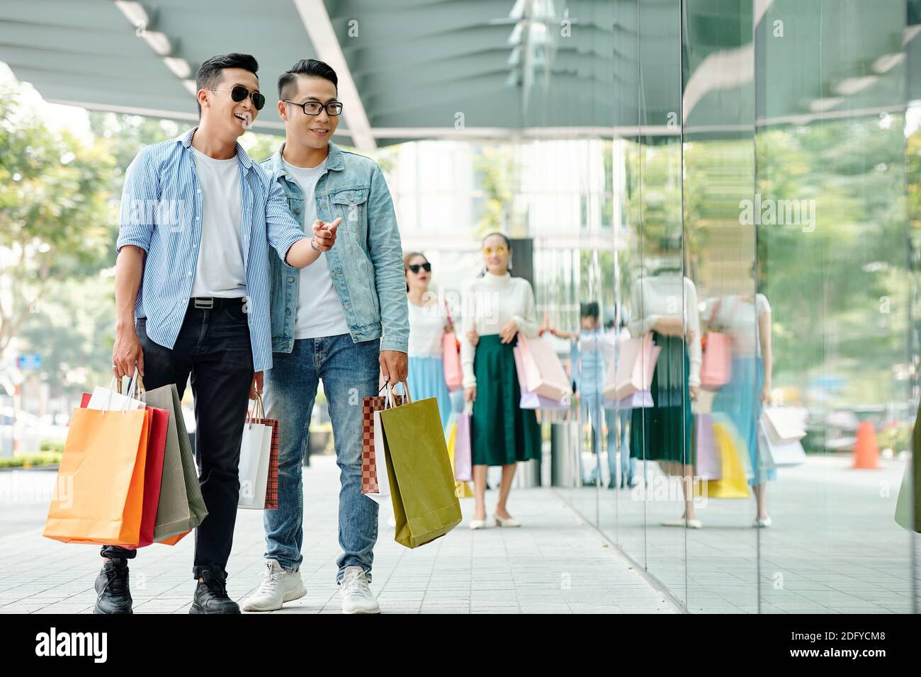 Handsome guys shopping Stock Photo