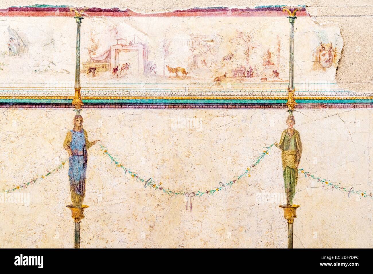 Roman period Fresco with figures of caryatids holing garlands from the Villa of the Farnesina displayed at the National Roman Museum, Palazzo Massimo. Stock Photo