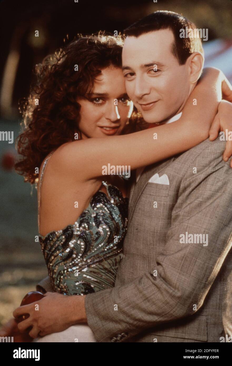 Paul Reubens as Pee Wee Herman with Gina Piccolapupula a trapeze artist,  played by Valeria Golino, in Big Top Pee Wee Stock Photo - Alamy