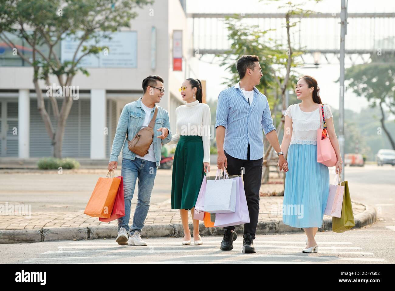 Young couple with shopping bags Stock Photo