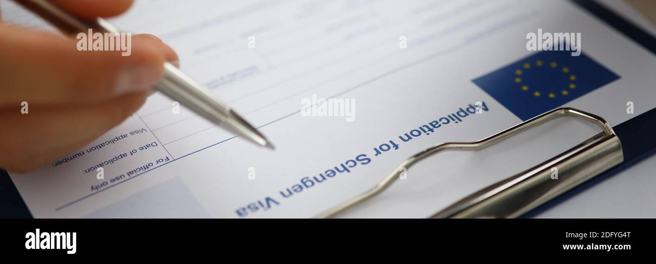 Focus on mans hand Stock Photo