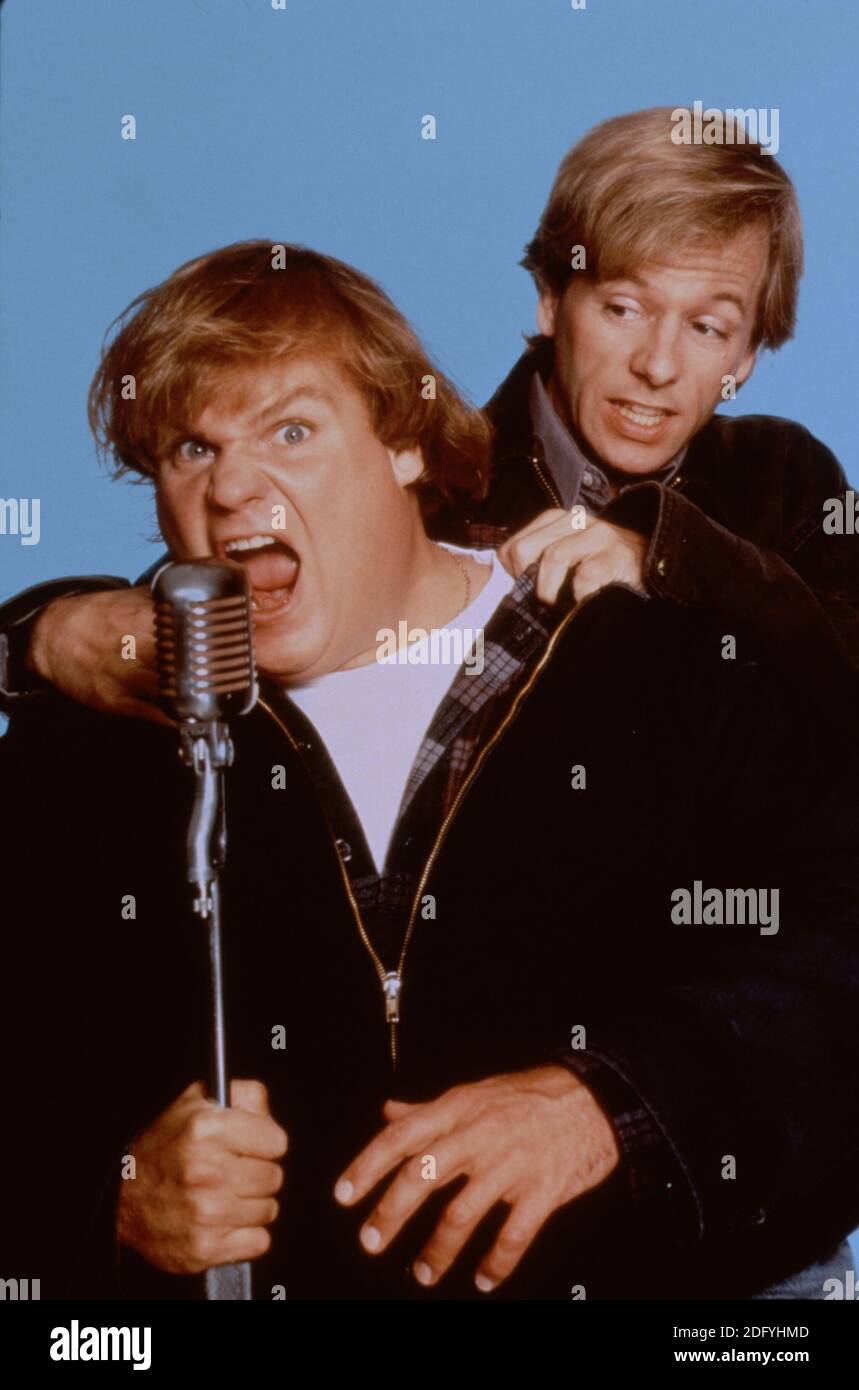 Chris Farley portrays Mike Donnelly and David Spade portrays Steve Dodds in the movie Black Sheep Stock Photo