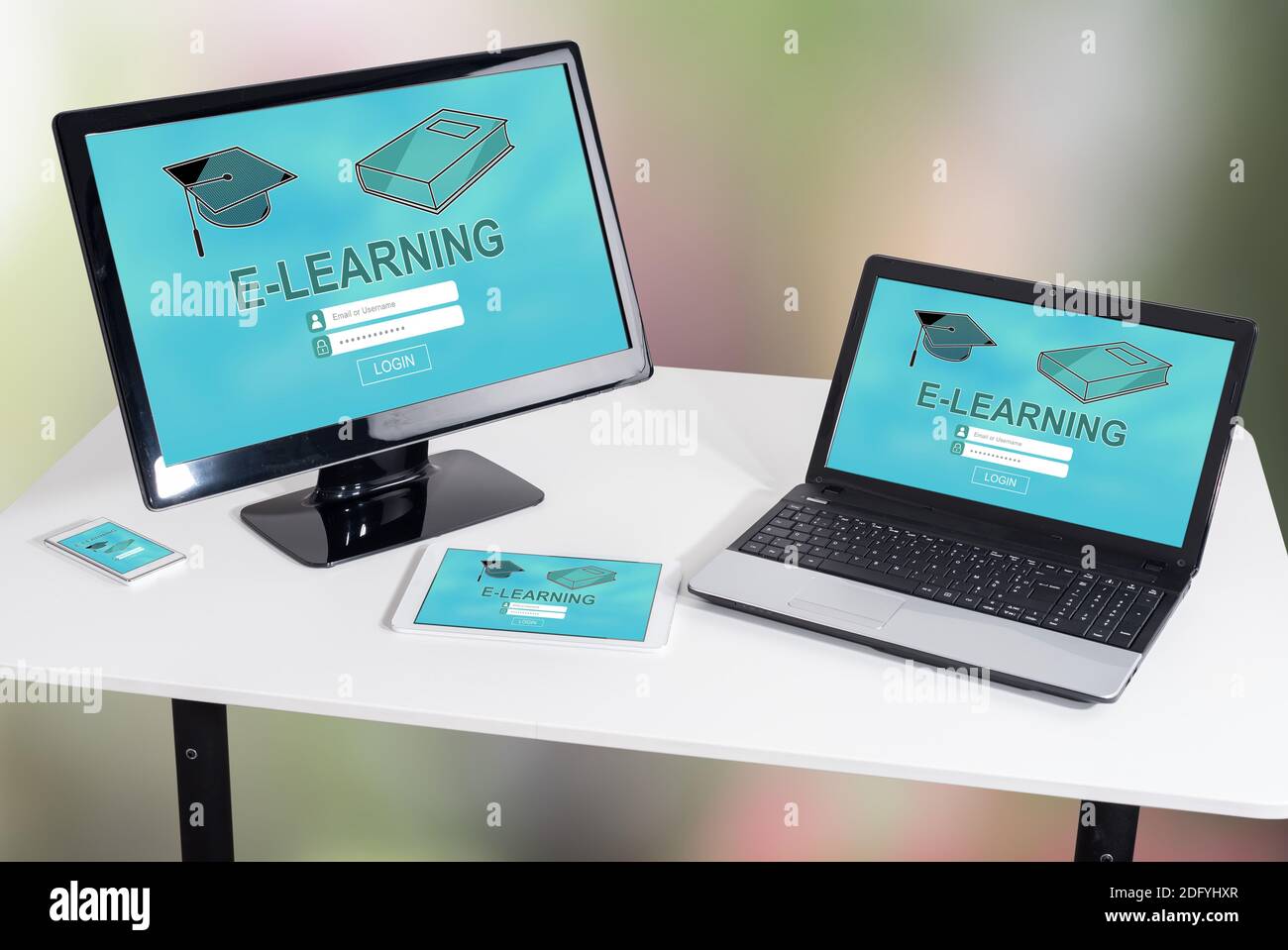 E-learning concept shown on different information technology devices Stock Photo