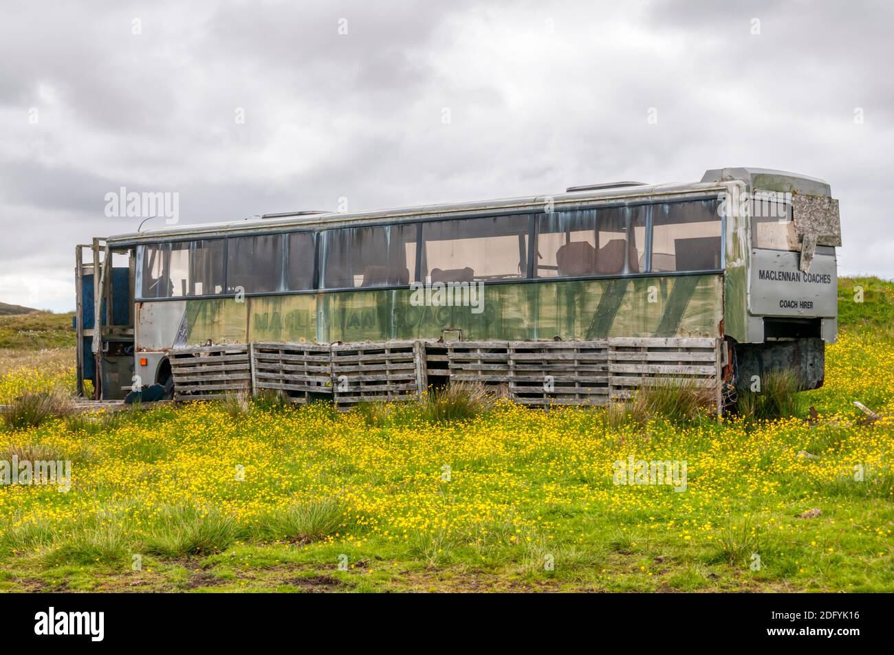 An old abandoned coach or bus on the peat beds at Cuidhsiadar on the Isle of Lewis in the Outer Hebrides. Stock Photo