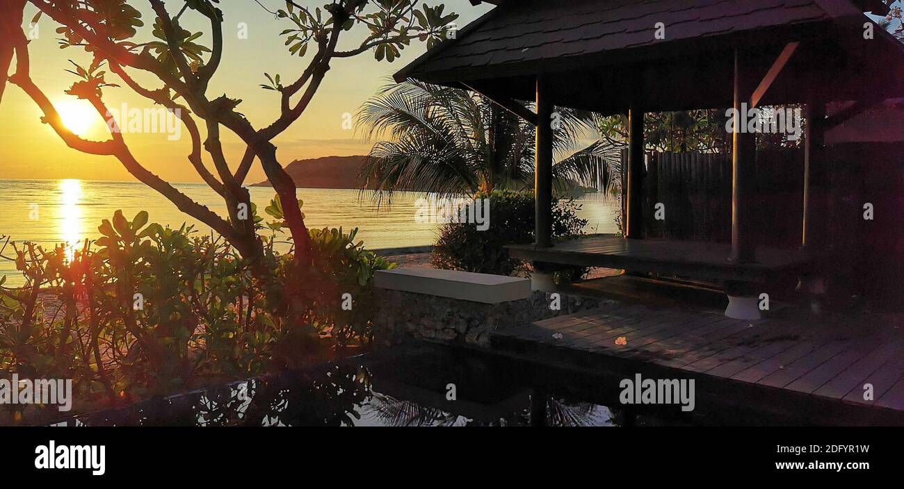 Thai home with sun rise view Stock Photo