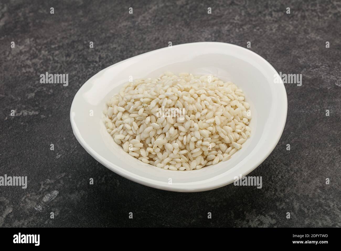 Raw Italian arborio rice for Risotto Stock Photo - Alamy