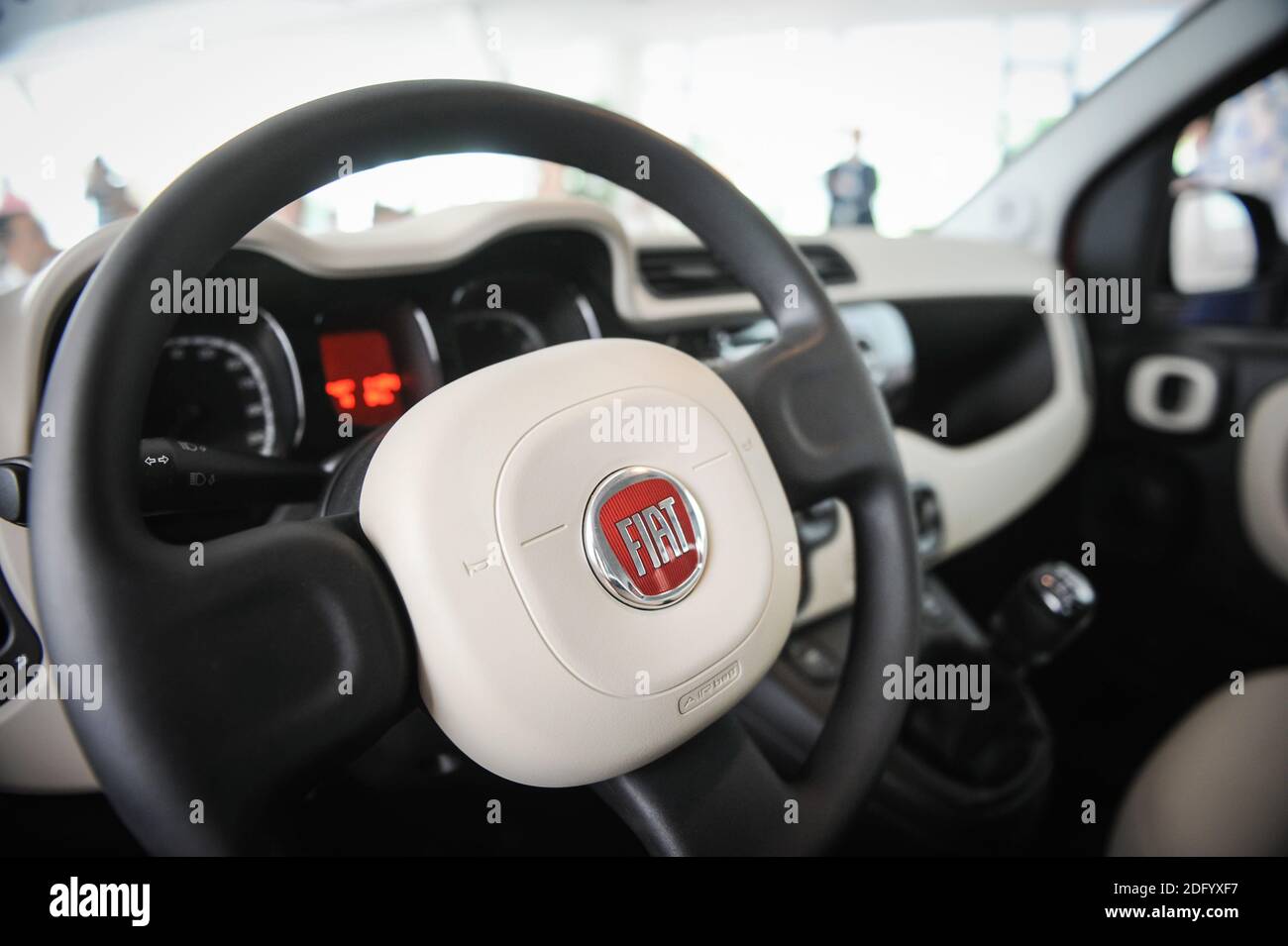 Bucharest, Romania - June 20, 2012: Details from inside a Fiat car with the steering wheel and the Fiat logo. Stock Photo