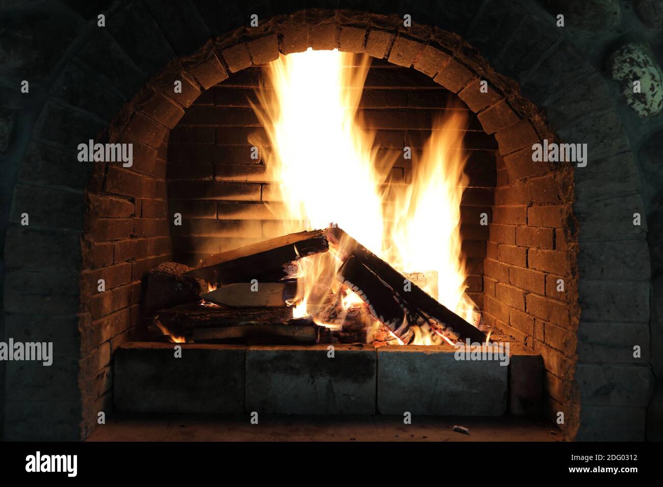 View of burning wood in the fireplace Stock Photo - Alamy
