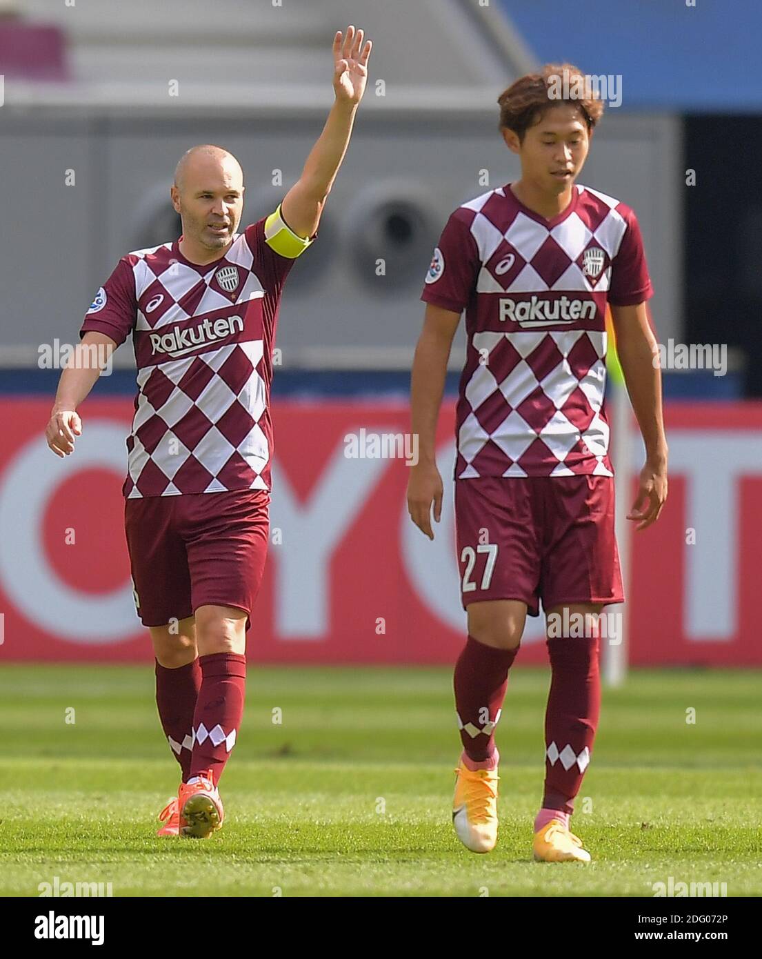 Doha, Qatar. 7th Dec, 2020. Andres Iniesta (L) of Vissel Kobe celebrates his goal during the round of 16 match of the AFC Champions League between Shanghai SIPG FC of China and Vissel Kobe of Japan in Doha, Qatar, Dec. 7, 2020. Credit: Nikku/Xinhua/Alamy Live News Stock Photo