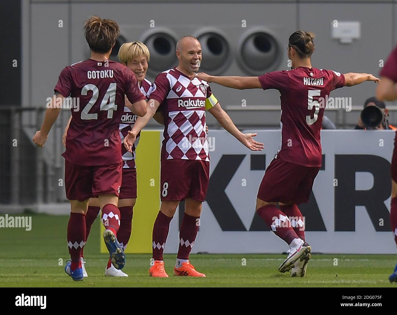 Doha, Qatar. 7th Dec, 2020. Andres Iniesta (2nd R) of Vissel Kobe celebrates his goal with teammates during the round of 16 match of the AFC Champions League between Shanghai SIPG FC of China and Vissel Kobe of Japan in Doha, Qatar, Dec. 7, 2020. Credit: Nikku/Xinhua/Alamy Live News Stock Photo