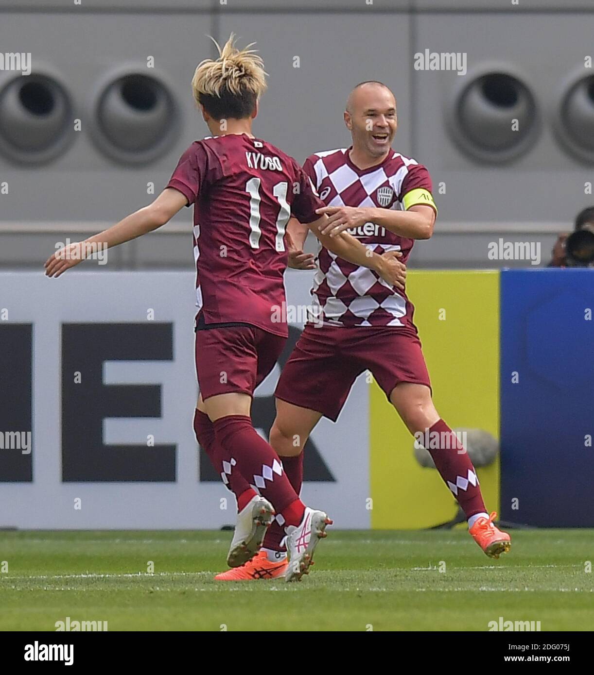 Doha, Qatar. 7th Dec, 2020. Andres Iniesta (R) of Vissel Kobe celebrates his goal during the round of 16 match of the AFC Champions League between Shanghai SIPG FC of China and Vissel Kobe of Japan in Doha, Qatar, Dec. 7, 2020. Credit: Nikku/Xinhua/Alamy Live News Stock Photo