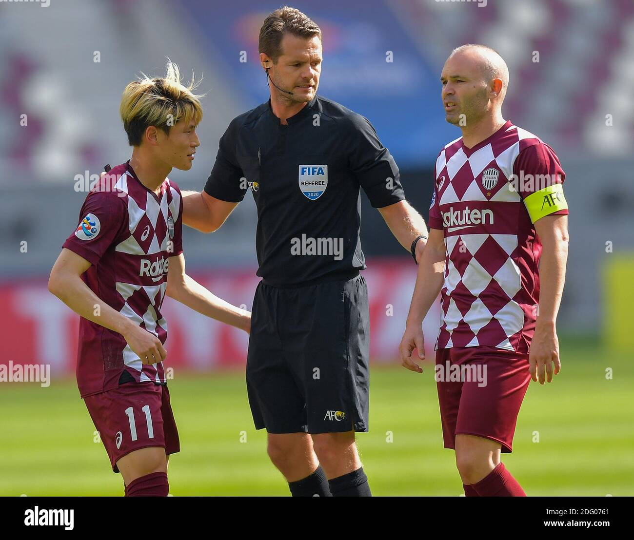 Doha, Qatar. 7th Dec, 2020. Andres Iniesta (R) of Vissel Kobe reacts during the round of 16 match of the AFC Champions League between Shanghai SIPG FC of China and Vissel Kobe of Japan in Doha, Qatar, Dec. 7, 2020. Credit: Nikku/Xinhua/Alamy Live News Stock Photo