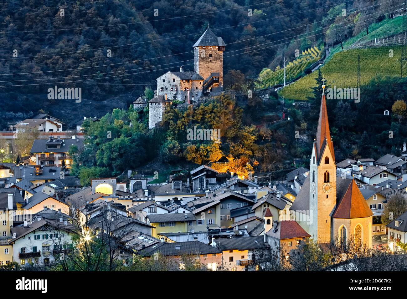 The village of Chiusa and the Branzoll castle in autumn. Isarco valley, Bolzano province, Trentino Alto-Adige, Italy, Europe. Stock Photo