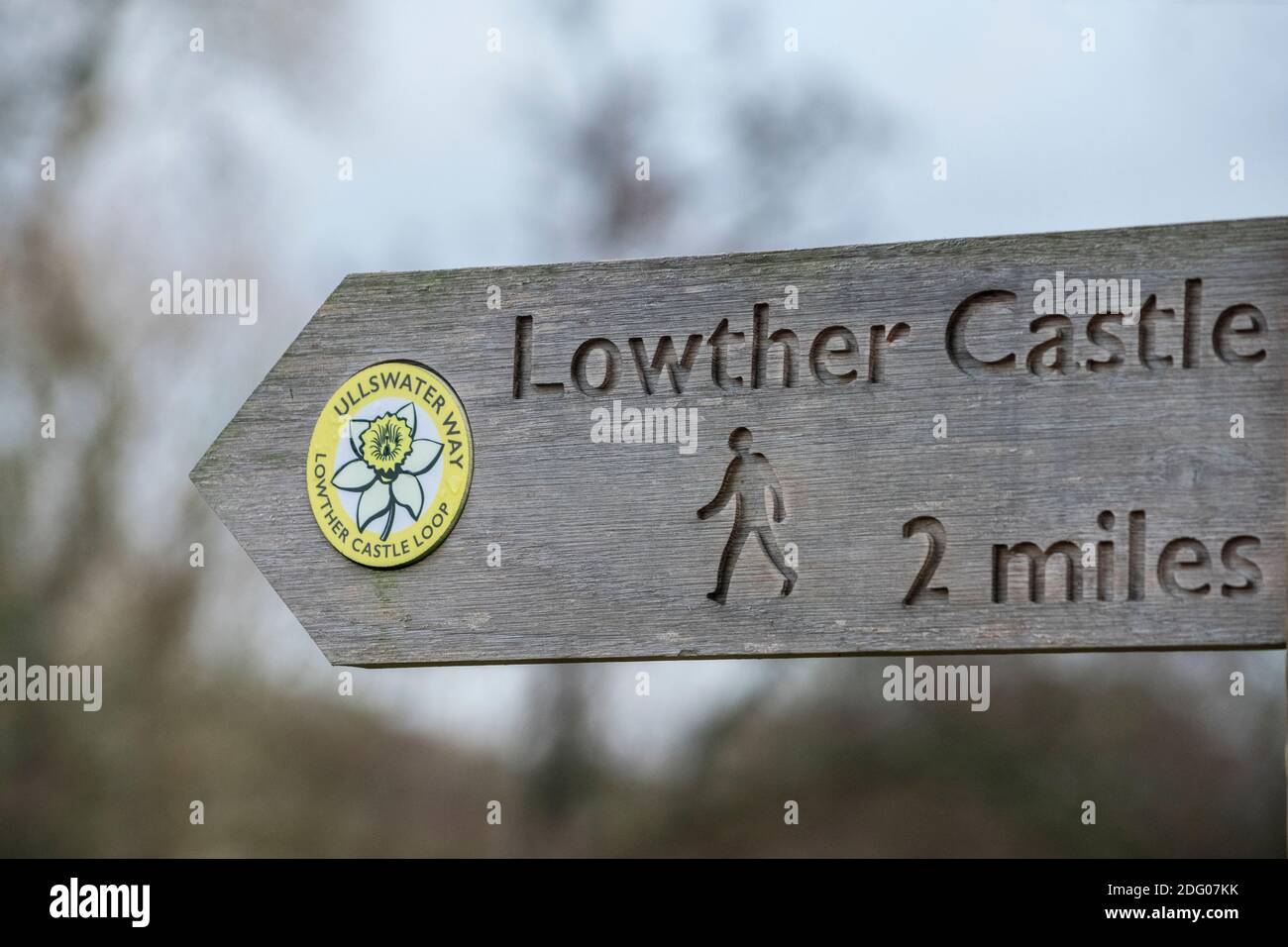 Wooden fingerpost sign on the Ullswater Way Lowther Castle loop in the English Lake District Stock Photo