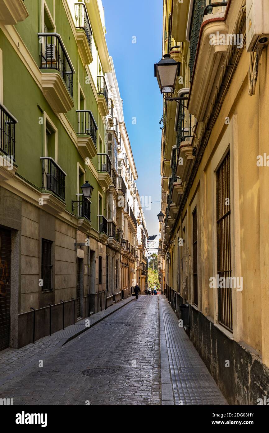 Residential Houses And Shops In An Old Town Alley Of Cadiz, Andalusia, Spain, Europe Stock Photo