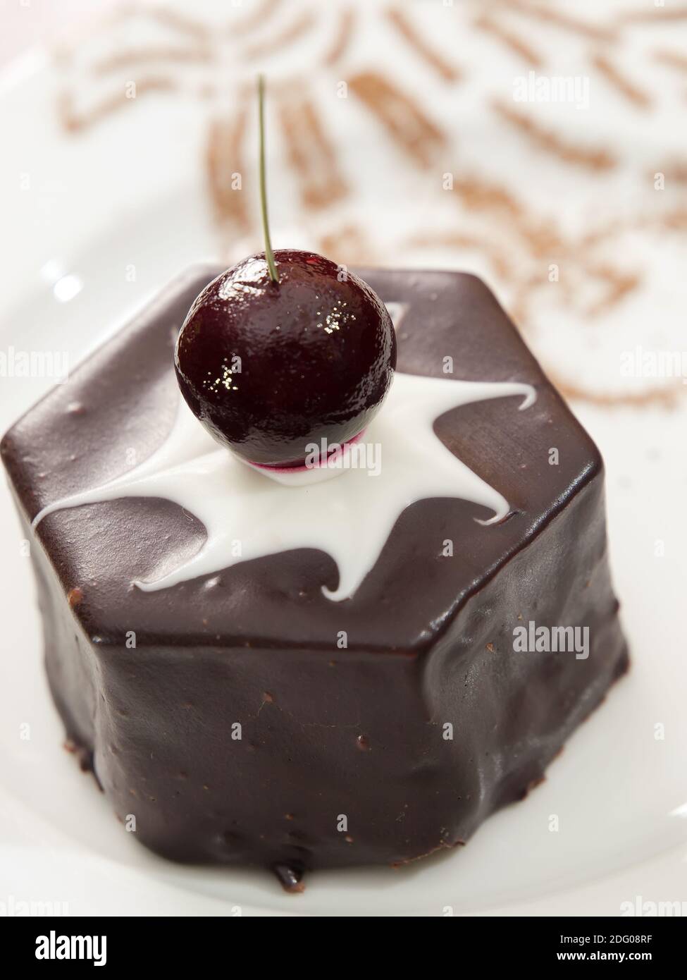 chocolate cake with cherry on a top Stock Photo - Alamy