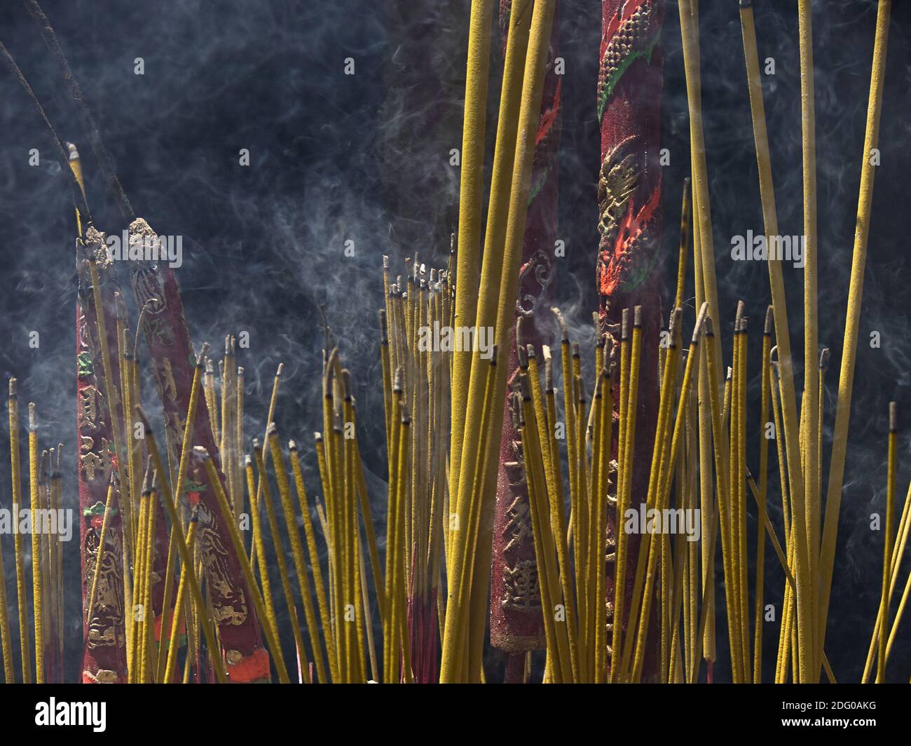 Coloured incense sticks hi-res stock photography and images - Alamy