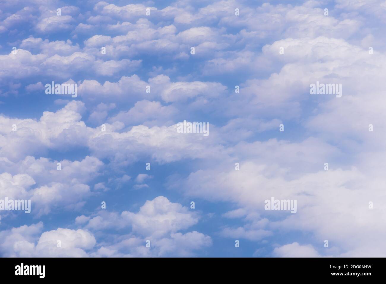 Blue sky background with white clouds on sunny day Stock Photo - Alamy
