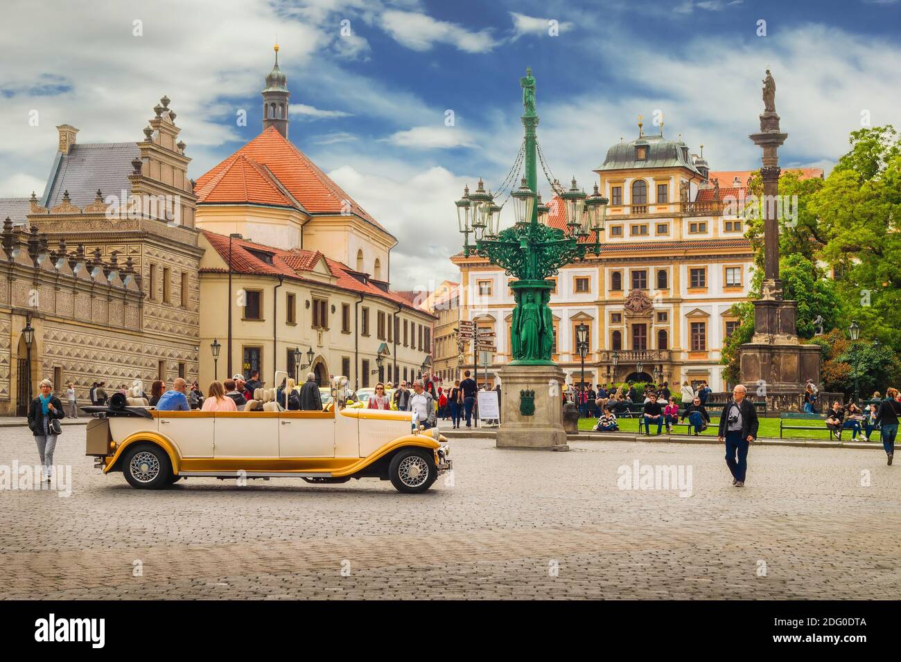 Prague, Czech Republic - May 23, 2015: And old timer car driving through Hradcany square Stock Photo