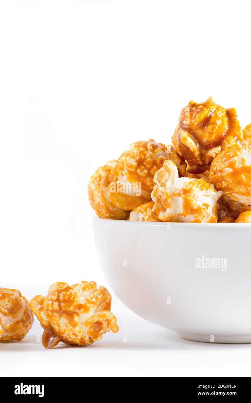Sweet caramel candy popcorn in a bowl white background Stock Photo Alamy